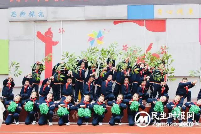 风车坪学校举行“让身边多一份绿”周会活动
